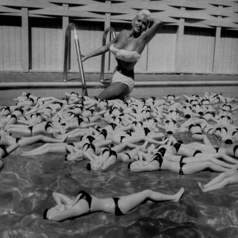 'Actress Jayne Mansfield Posing with Shaped Hot Water Bottles Floating