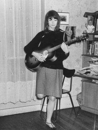 'French Singer Francoise Hardy Playing Guitar as She ...