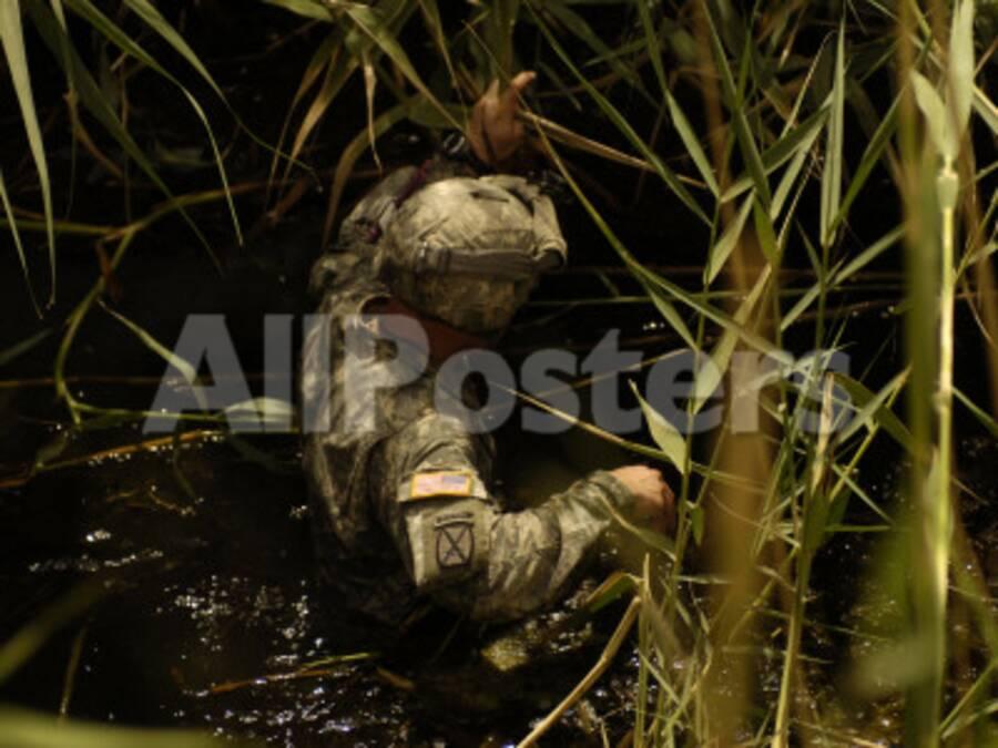 A Us Army Soldier Searches For Three Missing Soldiers In Yusifiyah Iraq May 15 2007