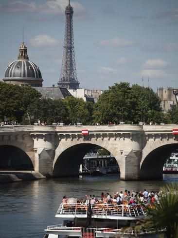 Tour Boat In River Seine With Pont Neuf And Eiffel Tower In The