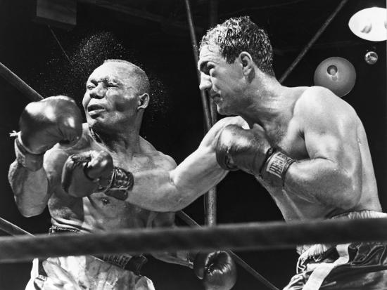 'Rocky Marciano Landing a Punch on Jersey Joe Walcott ...