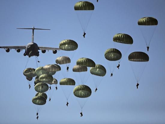 U.S. Army Paratroopers Jumping Out of a C-17 Globemaster III Aircraft ...