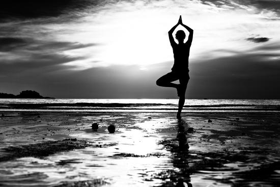 'Black And White Picture: Young Woman Practicing Yoga On The Beach At ...