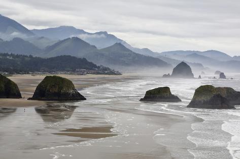 Usa Oregon Cannon Beach Fog Rises Over Coastline At Low Tide
