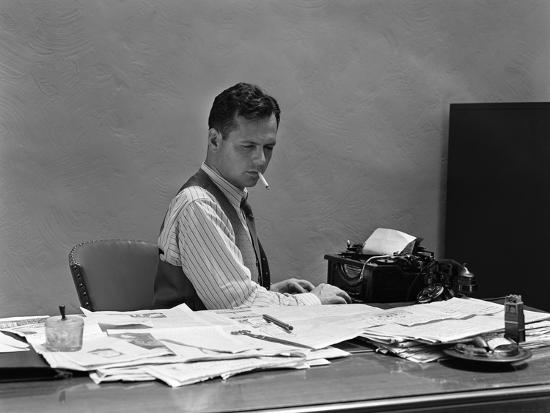 1930s 1940s Busy Man In Shirt Sleeves Behind Office Desk Working