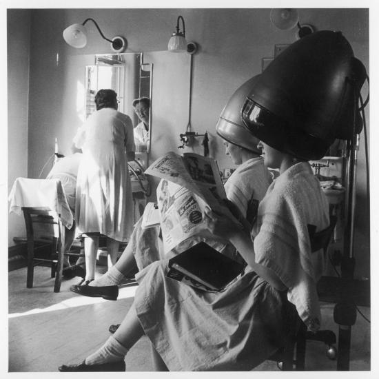 'Women Sitting under Hair Dryers at the Hairdressers' Photographic