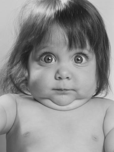 babies making funny faces