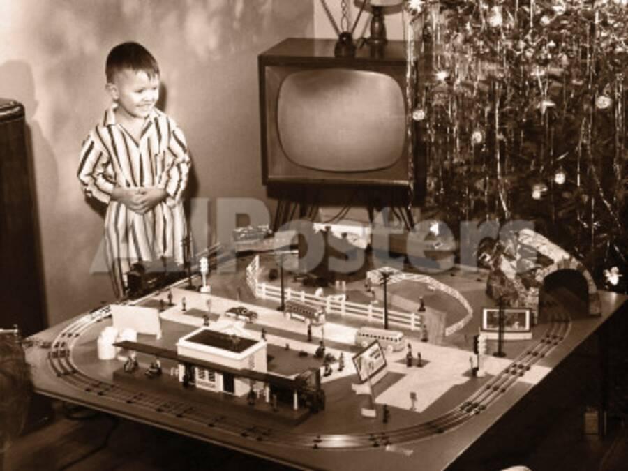 Boy 6 8 Looking At Model Train Set On Day