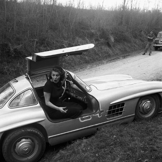 'Sophia Loren Sitting Into Her Mercedes at Third Cinema Rally