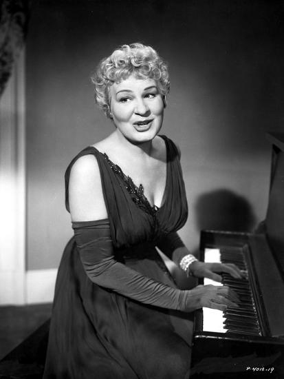 shirley booth on a dress playing a piano photo shirley booth on a dress playing a piano photo