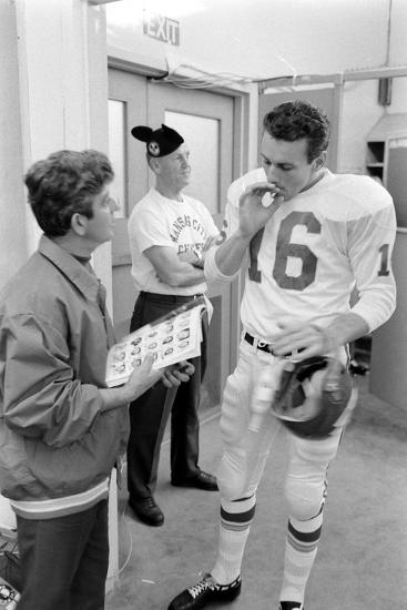 'Len Dawson, Quarterback for the Kansas City Chiefs, Smokes a