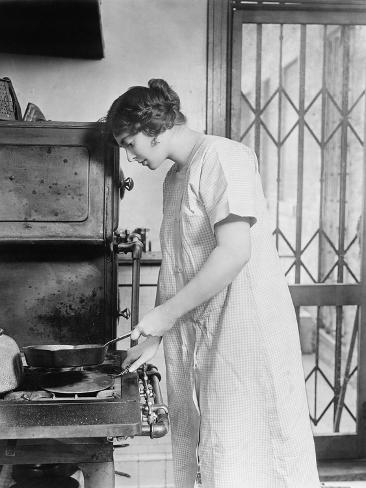 Woman Cooking on Stove Photo at