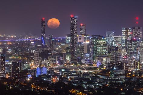 'Full moon rising over Brisbane city, Queensland, Australia