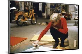 Andy with Spray Paint and Moped, The Factory, NYC, circa 1965-Nat Finkelstein-Mounted Art Print