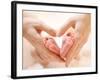 Baby Feet in Mother Hands. Tiny Newborn Baby's Feet on Female Heart Shaped Hands Closeup. Mom and H-Subbotina Anna-Framed Photographic Print