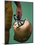 Football Player Holding His Helmet-Chris Trotman-Mounted Photographic Print