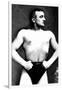 Bodybuilder with Thumbs Tucked in Belt-null-Framed Art Print